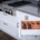 Photo by Luis Kuthe: https://www.pexels.com/photo/spoons-inside-a-kitchen-cabinet-5033522/ -- custom cabinet