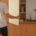 Photo by Cup of Couple: https://www.pexels.com/photo/person-opening-a-wooden-cabinet-7303850/ - soft-close cabinets