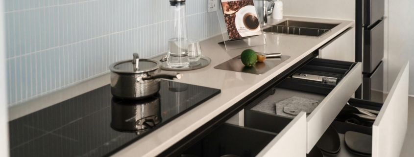 Photo by Alley Chien: https://www.pexels.com/photo/modern-kitchen-interior-with-open-drawers-35747333/