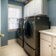 Photo by Curtis Adams: https://www.pexels.com/photo/front-load-washing-machine-beside-white-window-blinds-3935334/