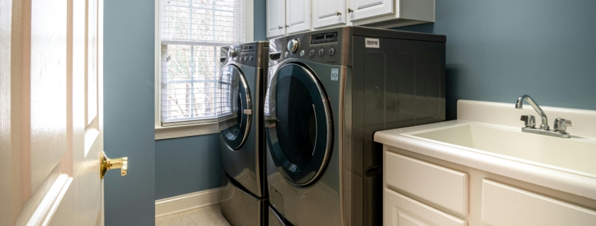 Photo by Curtis Adams: https://www.pexels.com/photo/front-load-washing-machine-beside-white-window-blinds-3935334/