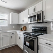 Photo by Curtis Adams: https://www.pexels.com/photo/contemporary-white-kitchen-interior-design-5071170/